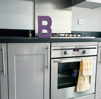 A smooth, flawless platinum grey spray painted finish for this Shefford Kitchen